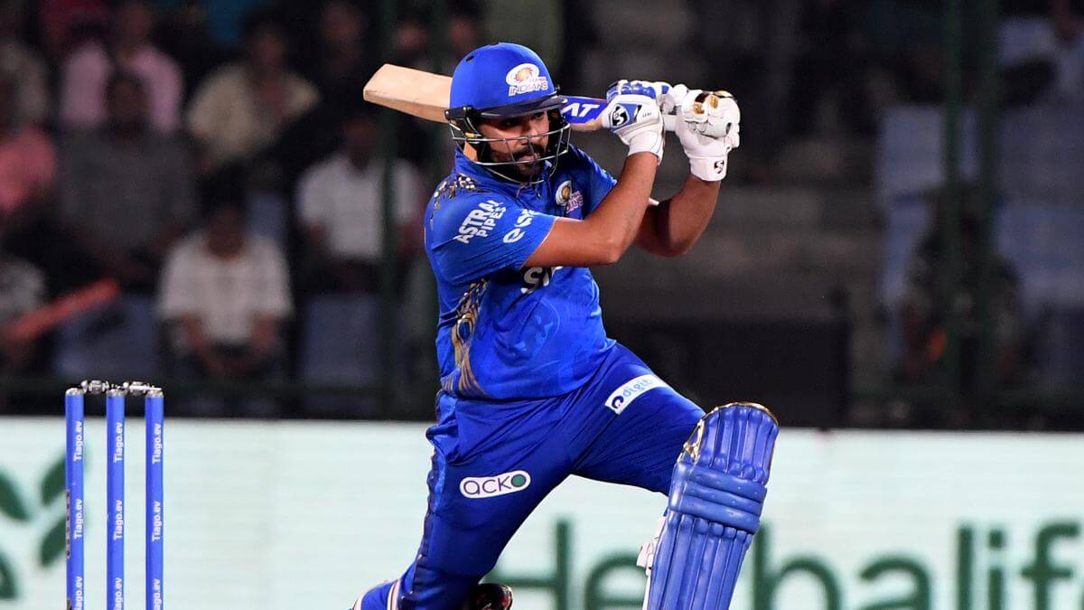 In the match between LSG and MI, Rohit Sharma dances down the pitch and hits a massive SIX.