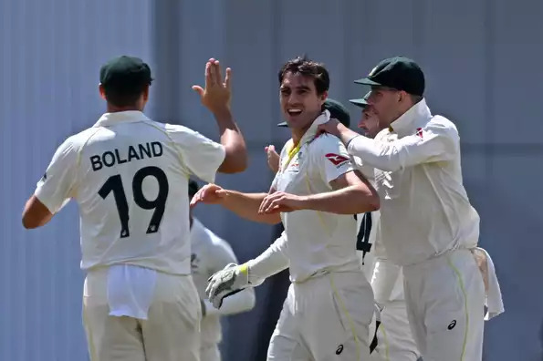 Pat Cummins and Mitchell Starc hit England twice in the early session.