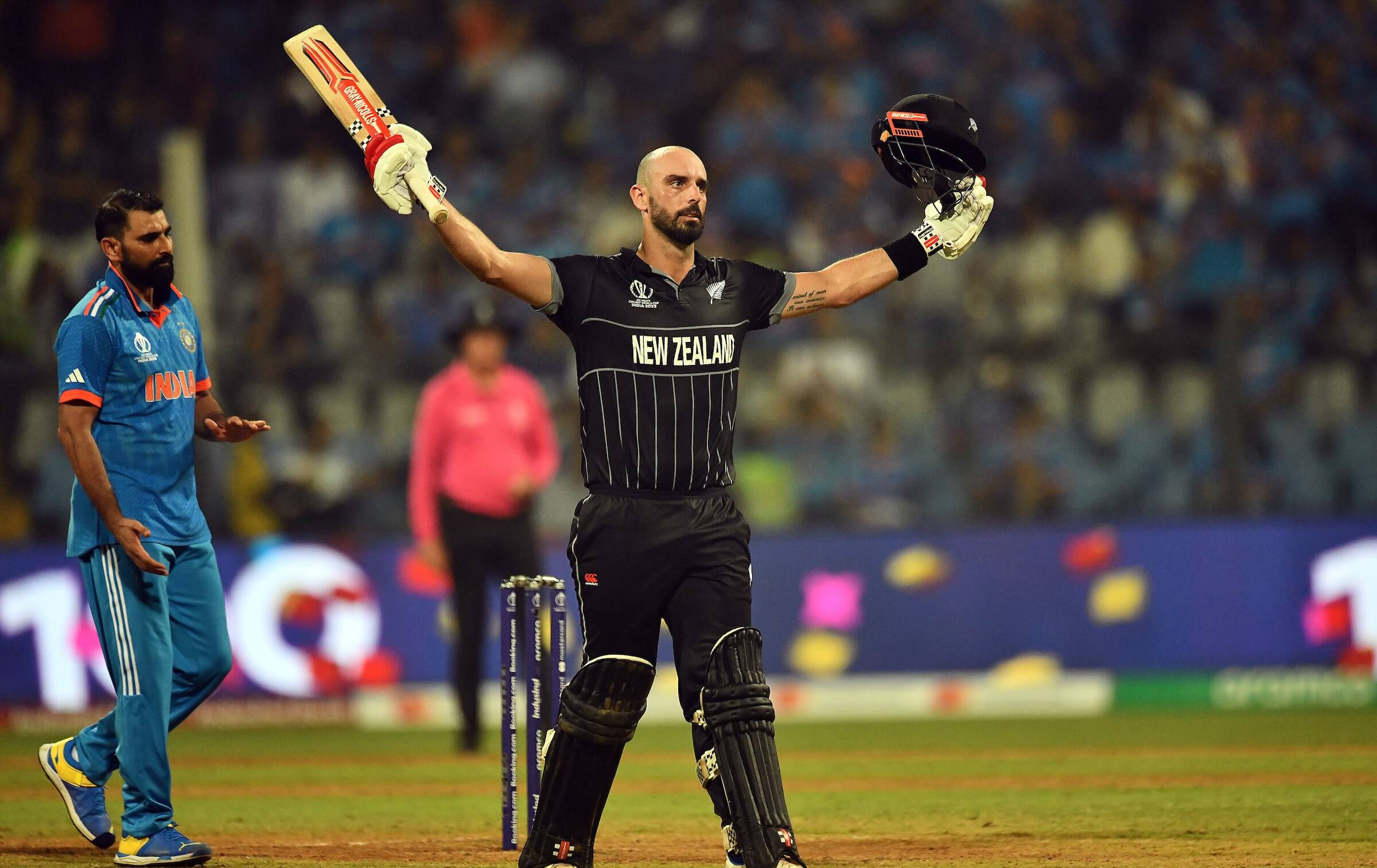 In the recent World Cup semifinal, Daryl Mitchell celebrates his century against India.